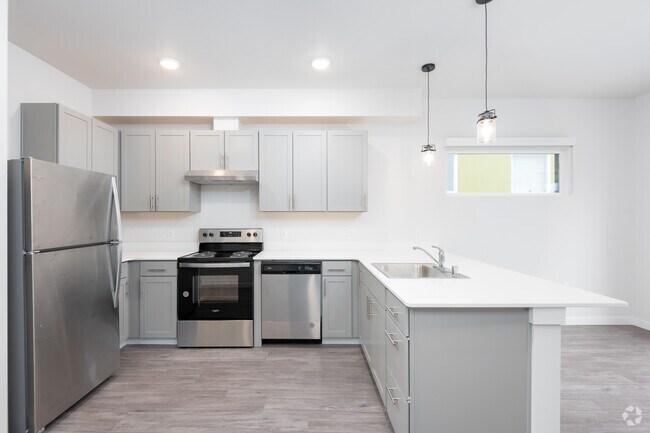 3HAB, 3,5BA - 1,325-1,347SF (Condominio esquinero) - Westman Mills Townhome & Apartments