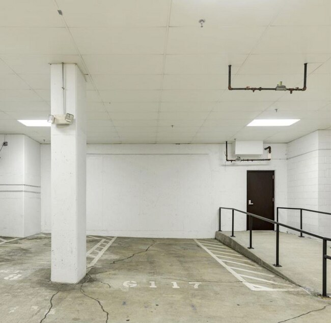 Reserved parking next to hallway leading to second entrance to unit - 1023 N Royal St