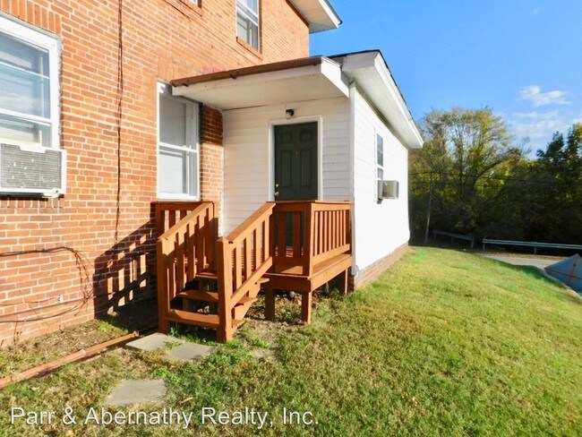 Building Photo - 3 br, 2 bath House - 601 E. Broadway Unit A