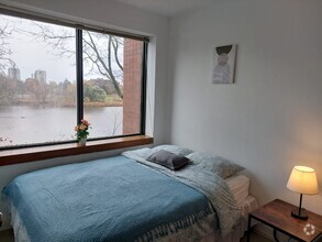 Building Photo - One Bedroom Apartment - RiverFlow