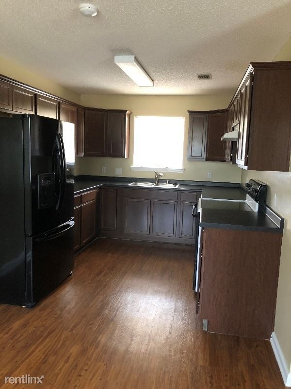 Building Photo - 3 br, 2 bath House - 910 Rice Ct