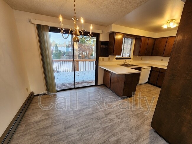 Building Photo - 10811 E 26th Ave