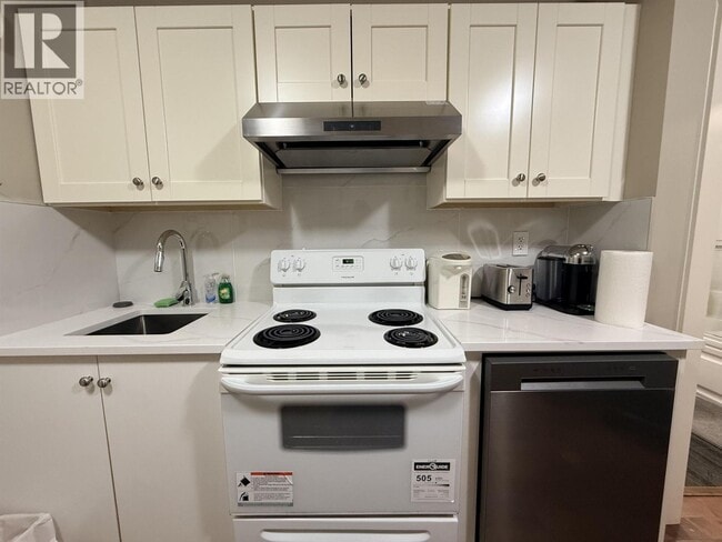 Photo du bâtiment - 888 W 61st Ave