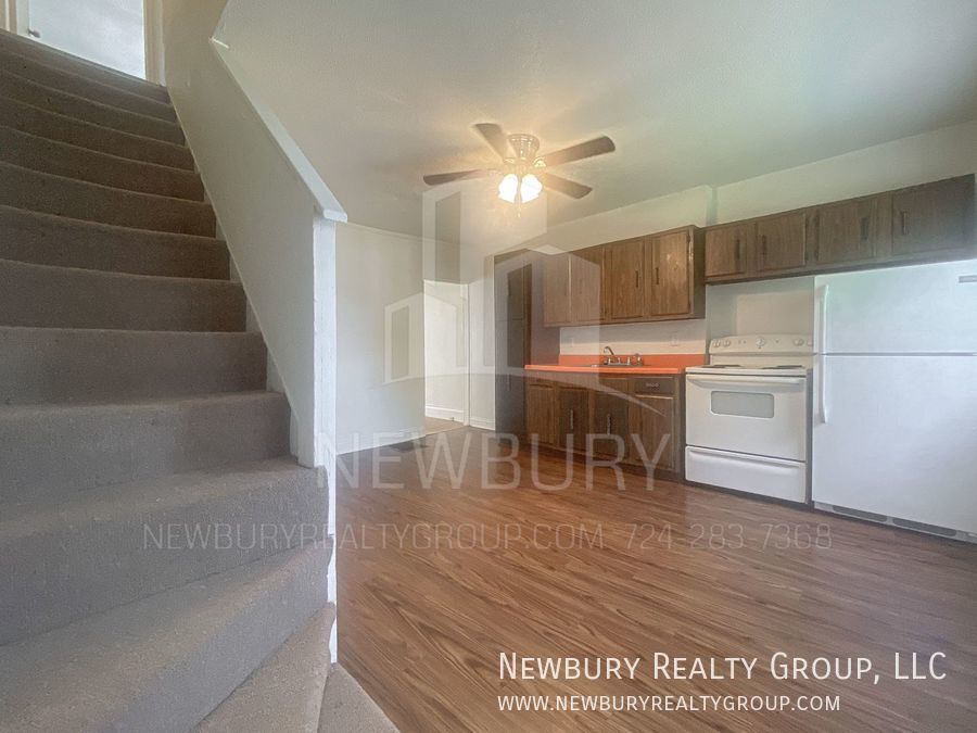 Primary Photo - Charming Two-Bedroom Townhouse-Style Apart...