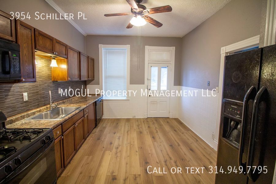 Primary Photo - HOUSE with fenced-in backyard, patio, and ...