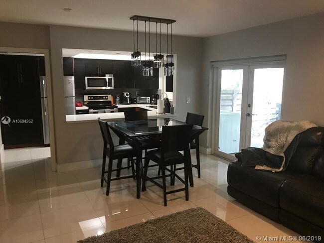 Building Photo - 7449 Twin Sabal Dr