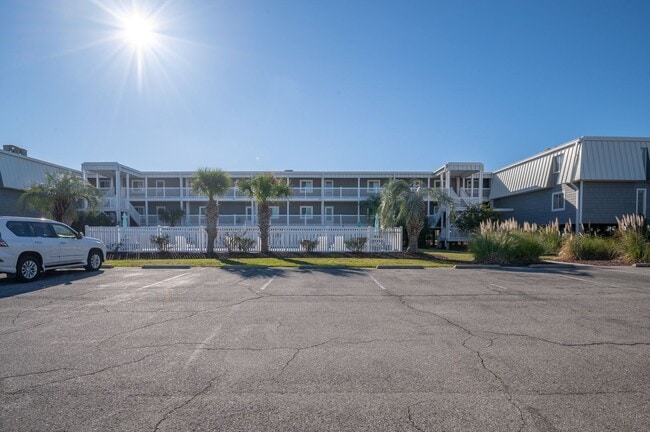 Building Photo - THIS OFF-SEASON MONTHLY RENTAL WILL HELP WITH THOSE WINTER BLUES