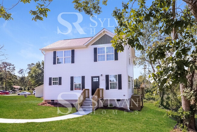 Building Photo - This lovely 3BR, 2.5BA home is move-in ready