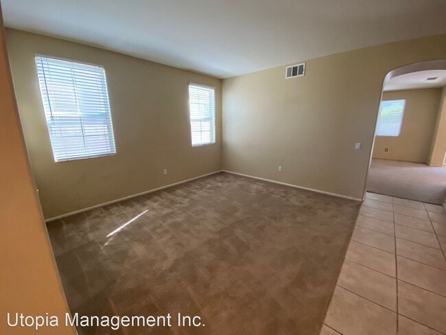 Building Photo - 4 br, 3 bath House - 44049 W. 47th St.