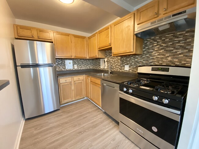 Cocina - Kings Park Plaza Apartment Homes