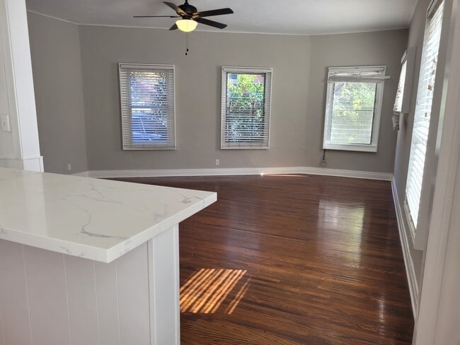 living space - tons of windows - 2477 Cheremoya Ave