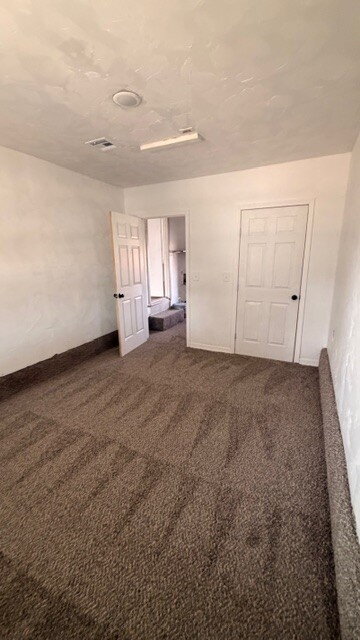 Photo - The Carport Cottage: Charming 3-Bedroom Brick Home Available Now.