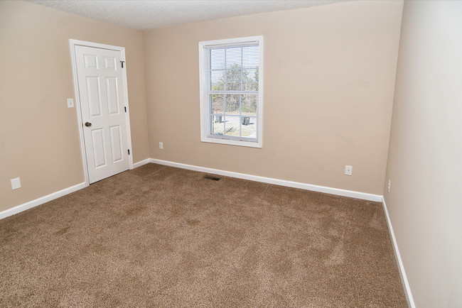 Building Photo - Priceville Townhomes