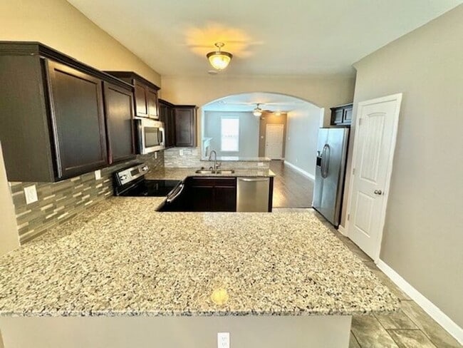 Building Photo - Luxury, Style, Gated Community, 4 Bedroom ...