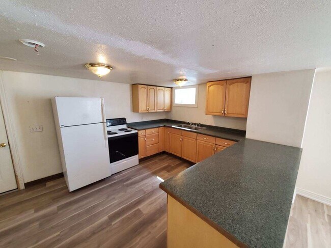 Open kitchen with lots of cabinets - 222 S 6th Ave