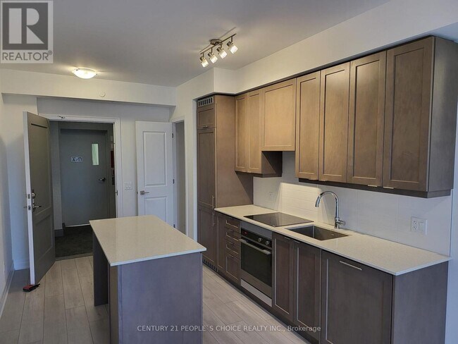 Building Photo - 30-1130 Elm Dr W