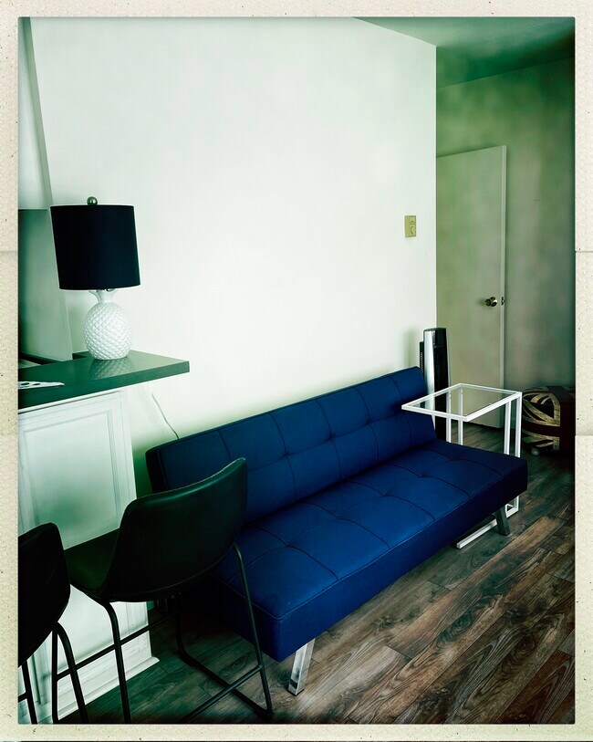 Sala de estar con sofá cama - 15 Spinnaker St