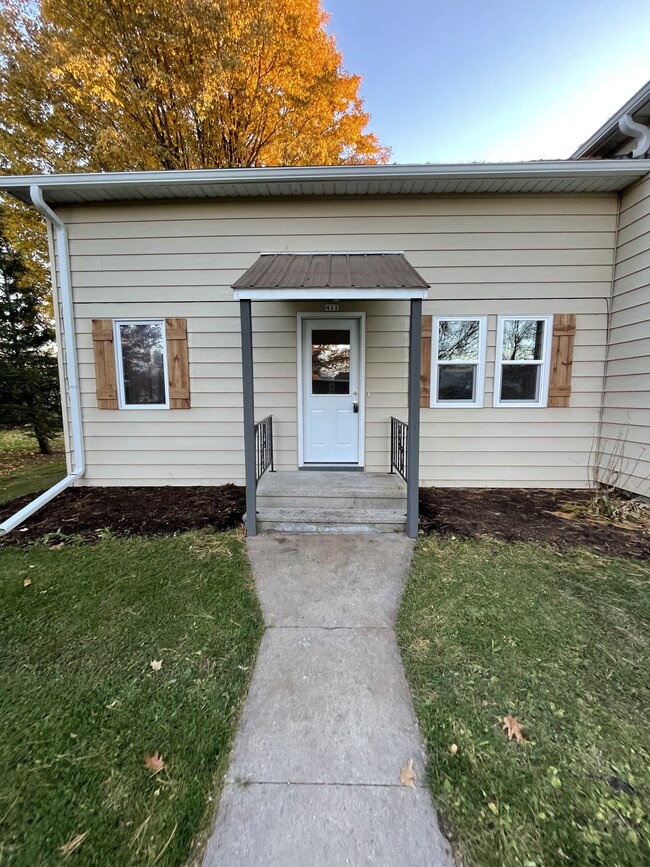 Front entry sidewalk view - 411 W Main St