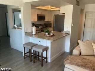 Foto del edificio - 5665 Trailwinds Dr