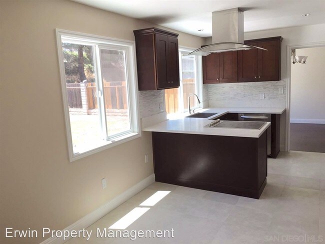 Building Photo - 5 br, 3 bath House - 7182 Bobhird Dr.
