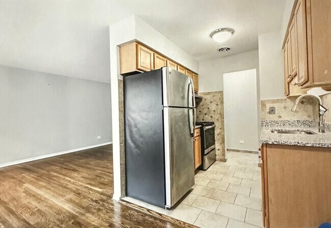 Foto del edificio - 6022 N Winthrop Ave