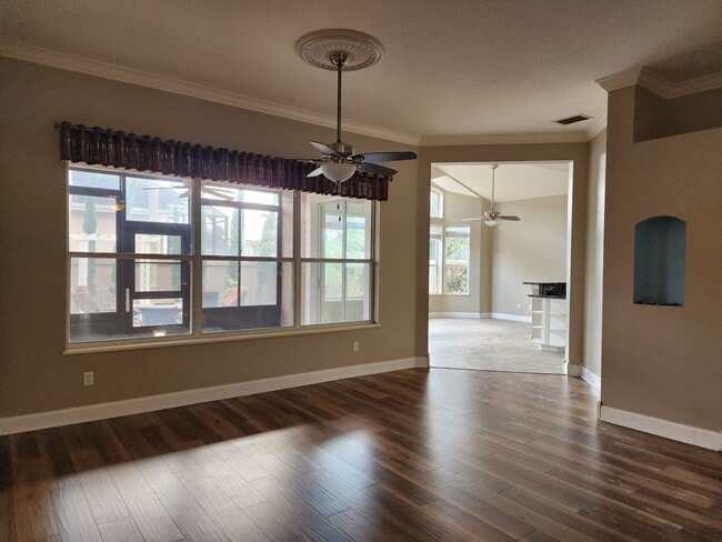 Building Photo - Hunters Creek Home with Fenced Back Yard in Guard-Gated Golf Community