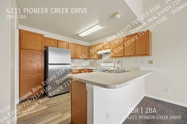 Building Photo - 4211 Pioneer Creek Dr