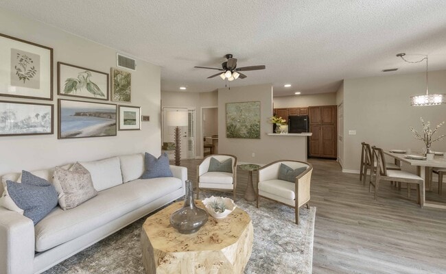 Spacious, open-concept living - Golf Brook Apartments