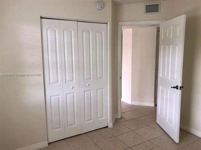 Building Photo - 11213 Royal Palm Blvd