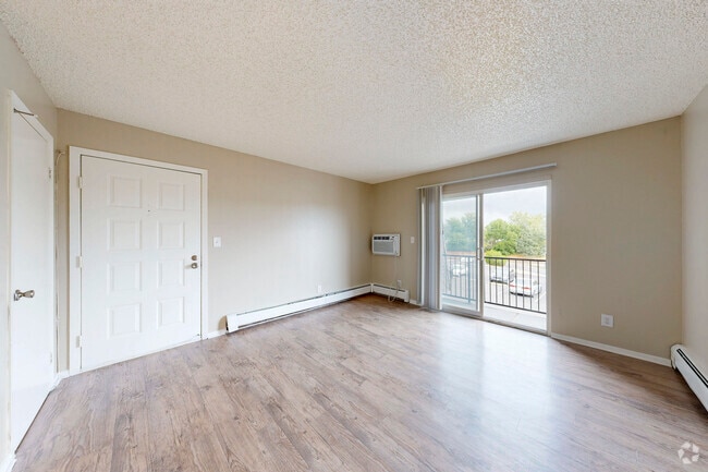 3BR, 1.5BA - 900SF - Living Room - Waterview on the Parkway Apartments