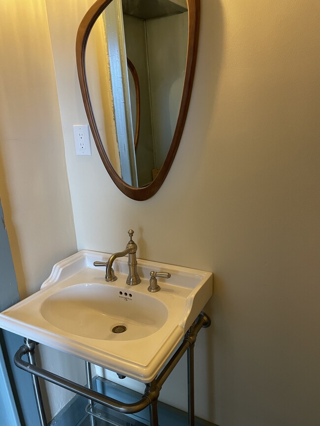 Powder room with console sink - 6 E Main St