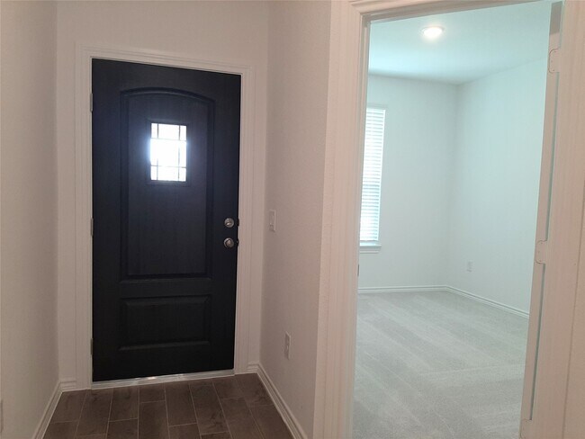 Foto del edificio - 16026 Tangled Vine Ln