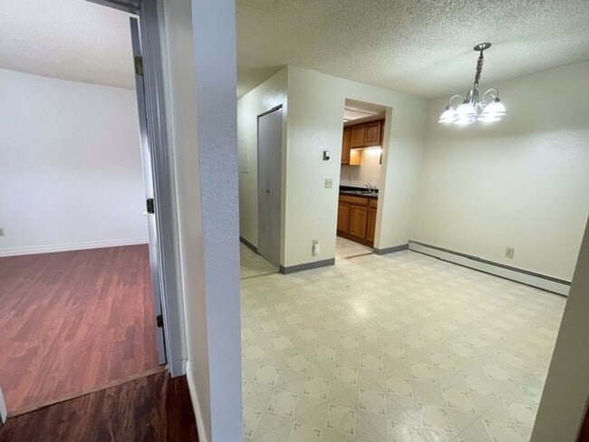 Building Photo - East Anchorage Condo with Laminate Floorin...