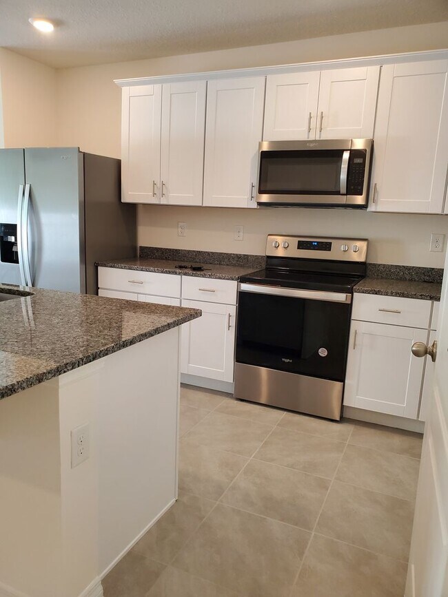Foto del edificio - Large Port Orange 3/2.5 townhome!