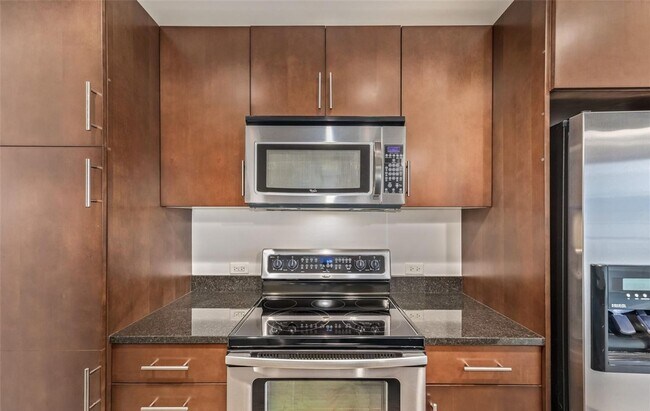 Building Photo - 1BD, 1BA Condo at The Spire with Bonus Fle...