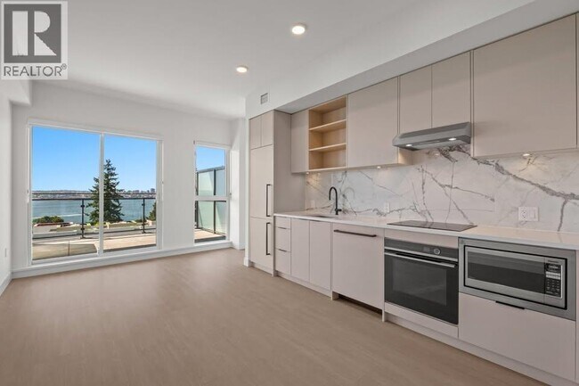 Photo du bâtiment - 422-422 E 3rd St