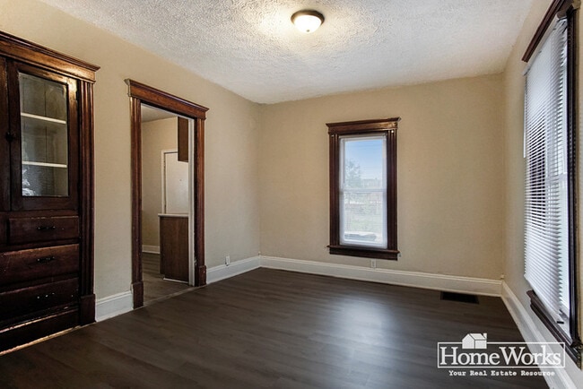 Building Photo - Charming 3 - Bedroom Home with Wrap-Around Porch on Corner Lot