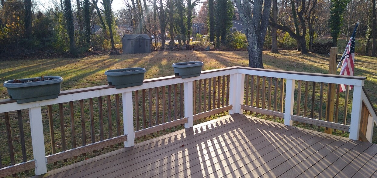 Back yard from deck - 211 Ash Ln