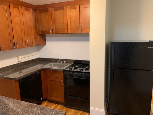 Building Photo - No Brokers Fee, No Security Deposit, Heat Hot Water Included, Laundry on a Site, Steps from the T...