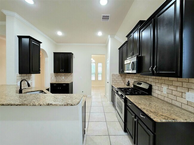 Foto del edificio - 7506 Amber Village Cir
