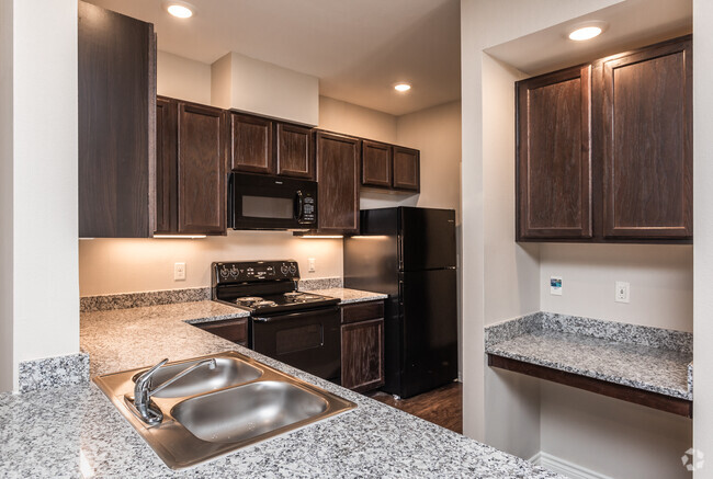 1BR, 1BA - 738SF Kitchen & built-In Desk - Residences at the Landing