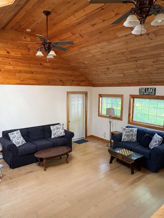 Building Photo - Charming 3BR Waterfront Retreat with Sunroom, Brick Accent & Scenic Lake Views