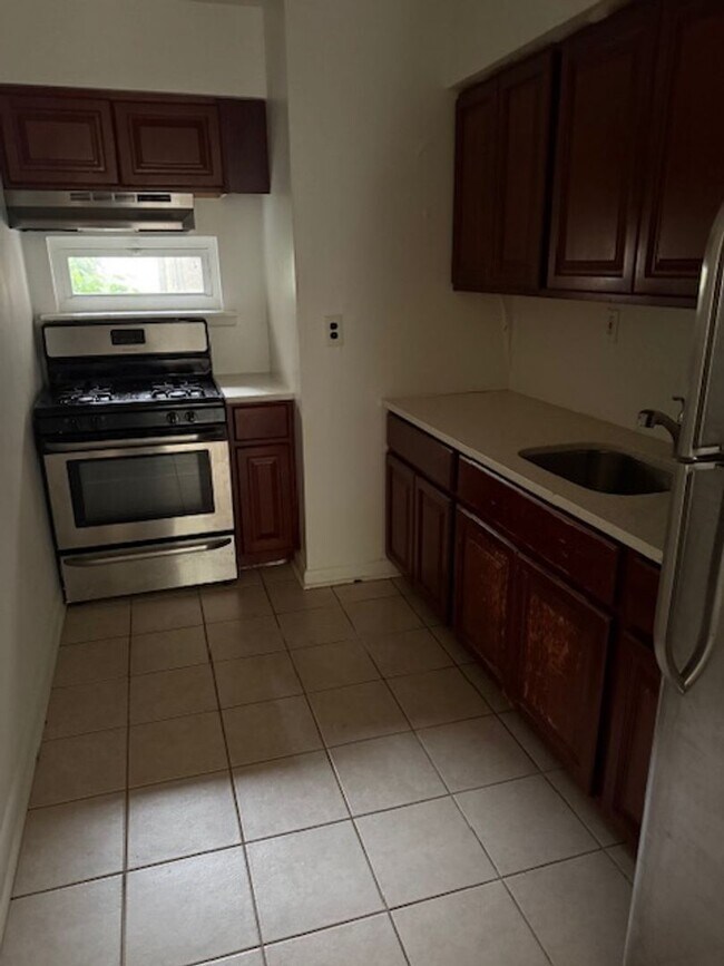 Photo - Renovated 2-Bedroom Apartment with Backyar...