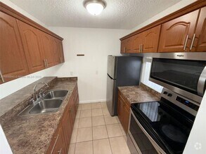 Building Photo - 8560 N Sherman Cir