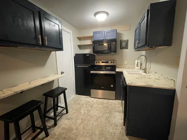 Building Photo - Studio apartment in Cairo, Georgia
