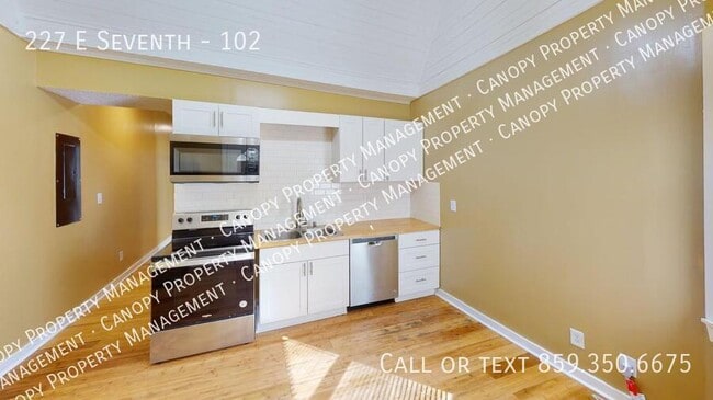 Building Photo - 227 E Seventh-102