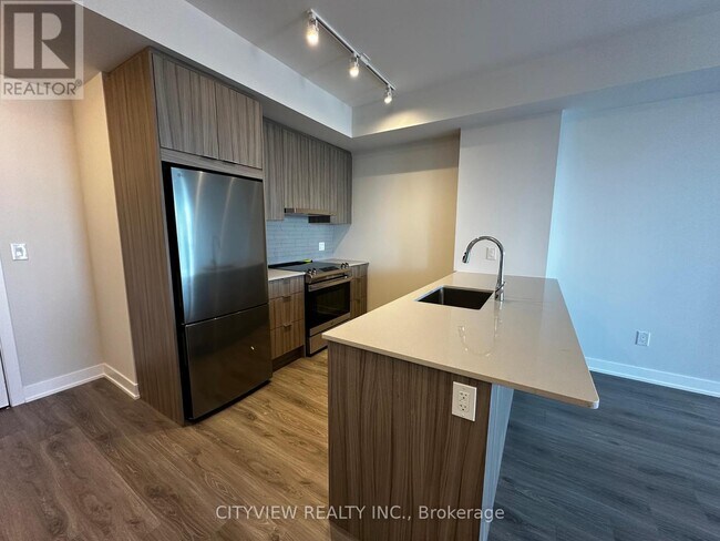 Photo du bâtiment - 430-4430 Square One Dr
