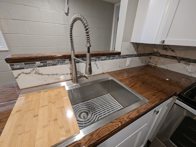 Farmhouse sink with detachable faucet sprayer - 329 1/2 S Hocker Ave
