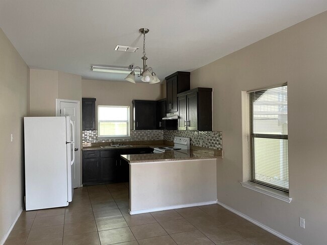 Building Photo - 5402 Marcella Ave