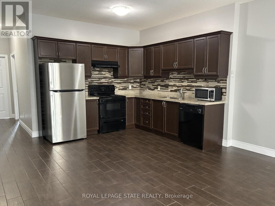 Photo principale - 136-136 King St W
